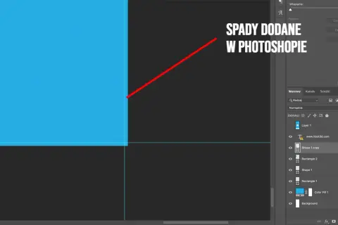 Linie pomocnicze w Photoshopie, pokazujące spady dodane do projektu.
