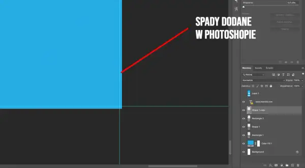 Linie pomocnicze w Photoshopie, pokazujące spady dodane do projektu.