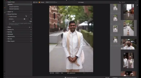 Mężczyzna w białej kurtce i szalu pozuje do zdjęcia. Capture One 23 grupuje obrazy ślubne.